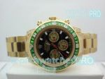 Replica Rolex Daytona Black Dial Green Diamond Bezel Gold Watch